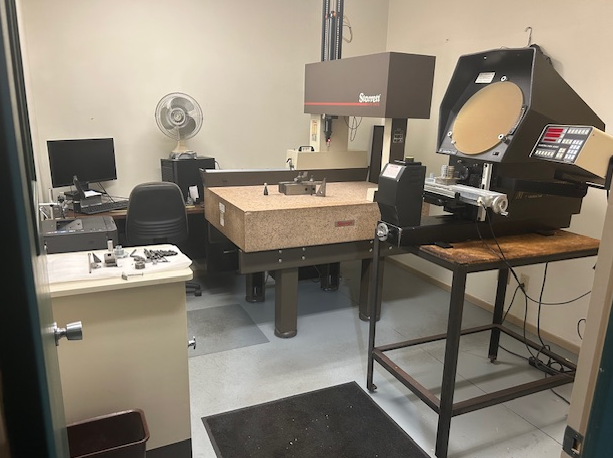 Cast Specialties quality room with CMM and optical comparator